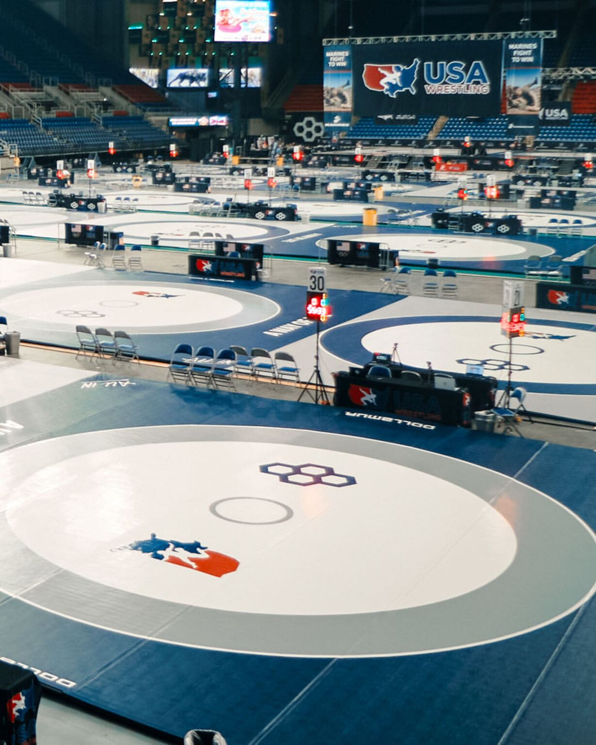 Competition mats inside the FargoDome at USA Wrestling Nationals