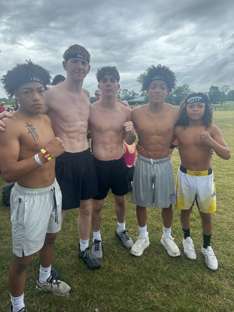 NC United wrestlers at the Spartan Race, team photo on course