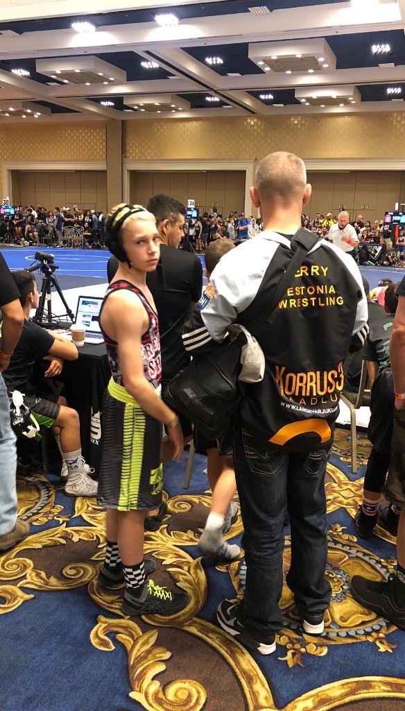 Caden Perry at a wrestling tournament in competition gear